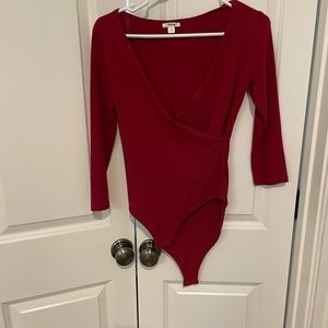 Beautiful wine-colored bodysuit. Very flattering!